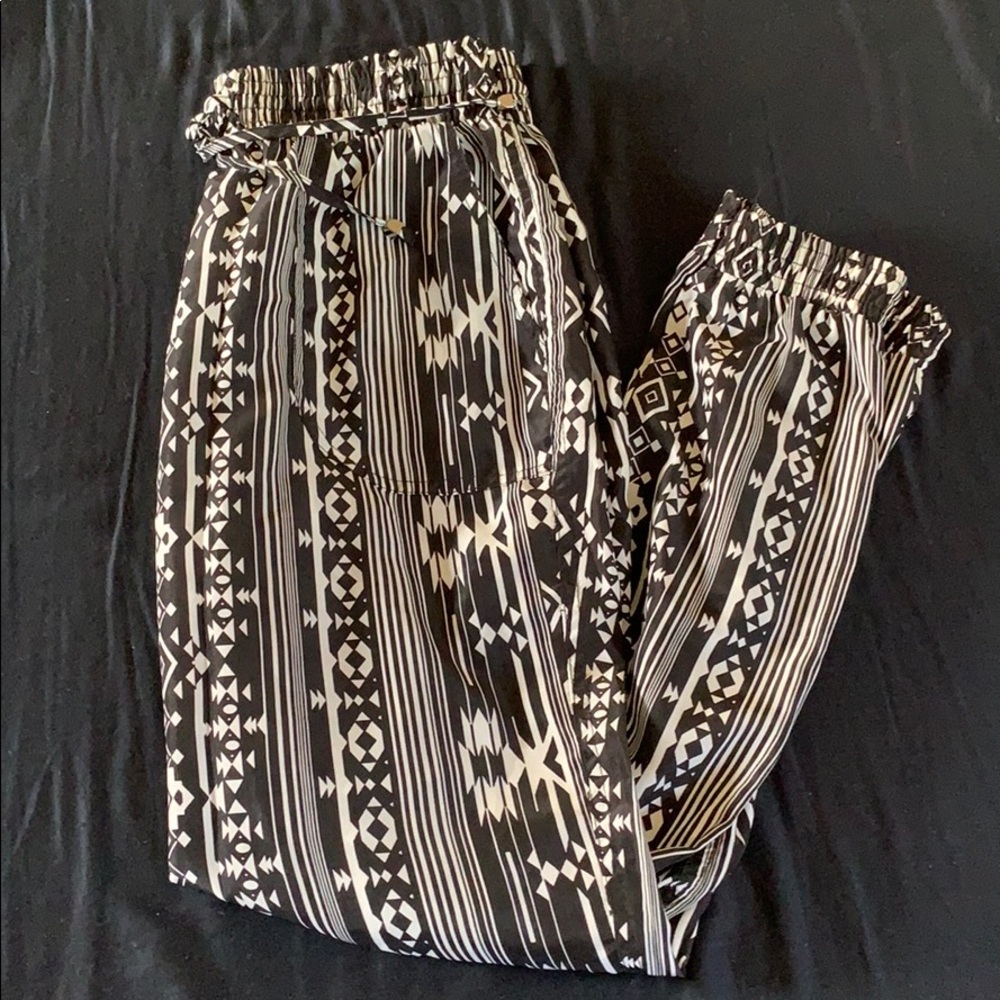 scrunched ankles , adjustable tie in front